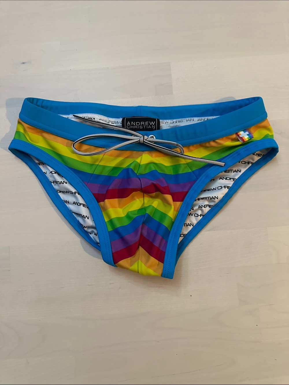 Andrew Christian Rainbow Stripe Swim Trunks with Blue Trim